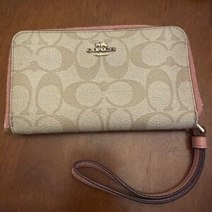 Coach Beige Signature Wristlet with Pink Trim and Gold Logo